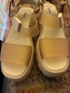 Melissa Kick Off Gold Glitter Jelly Platform Sandals with Adjustable Strap.